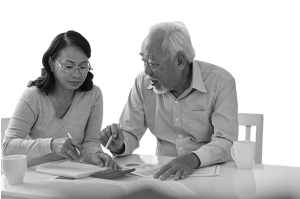 Couple discussing financial papers